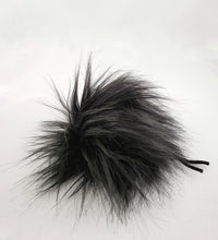 The RAVEN pom pom